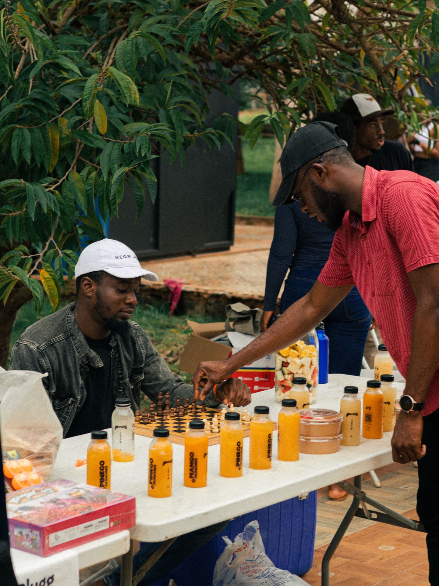 Munchies bottles lined up at a chess pop-up event